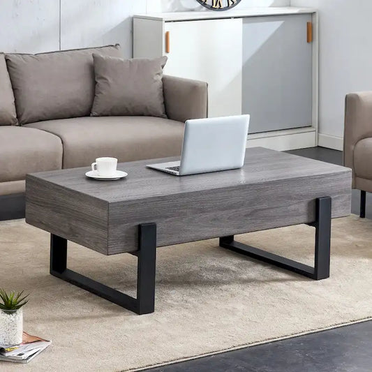 A Rustic Gray Wood Grain MDF Coffee Table With Black Metal Legs - An Elegant Space In Natural Wood Tones